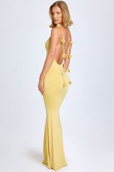 Vestido de punto de seda ceñido con apliques florales en amarillo pastel
