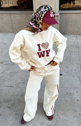 Sudadera extragrande "Jungla de concreto" de 11th Street color Bate de pastel